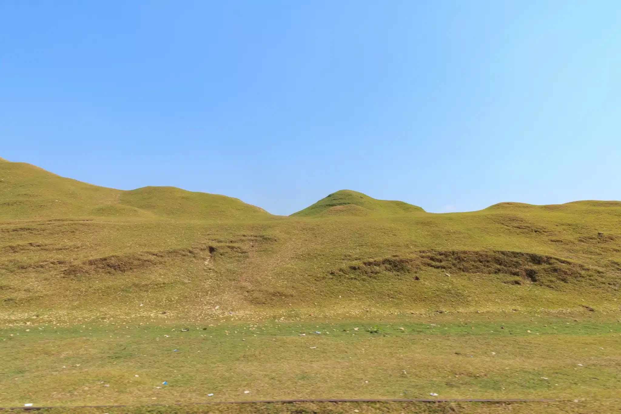 Sunny green hills under clear blue sky for Green Burial Services in Contra Costa County, California